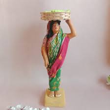 Female standing - vegetable seller